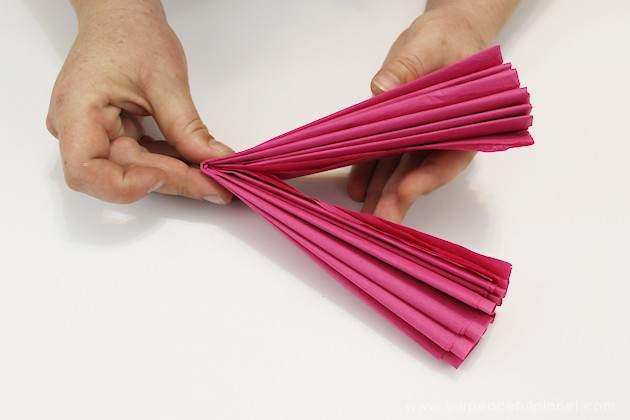 For simple & unique window treatment ideas you'll love our tissue paper flower window toppers. The gorgeous flowers cost pennies & take minutes to make.