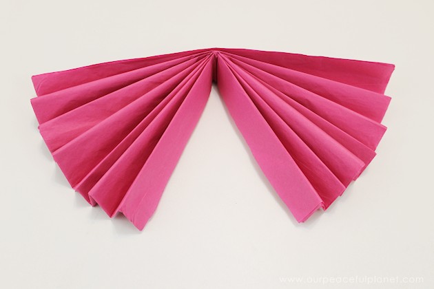 For simple & unique window treatment ideas you'll love our tissue paper flower window toppers. The gorgeous flowers cost pennies & take minutes to make.