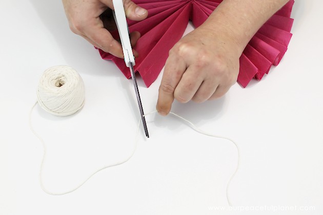 For simple & unique window treatment ideas you'll love our tissue paper flower window toppers. The gorgeous flowers cost pennies & take minutes to make.