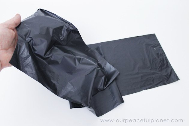 Need quick, low cost awesome looking Halloween decorations? Go to your cupboard, grab some black plastic trash bags & make a large creepy bat in 5 minutes!