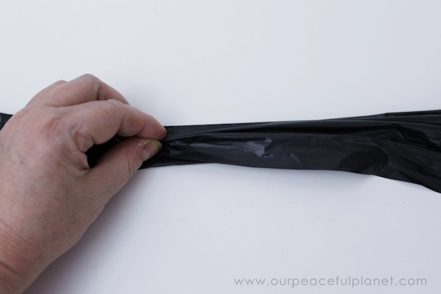 Need quick, low cost awesome looking Halloween decorations? Go to your cupboard, grab some black plastic trash bags & make a large creepy bat in 5 minutes!