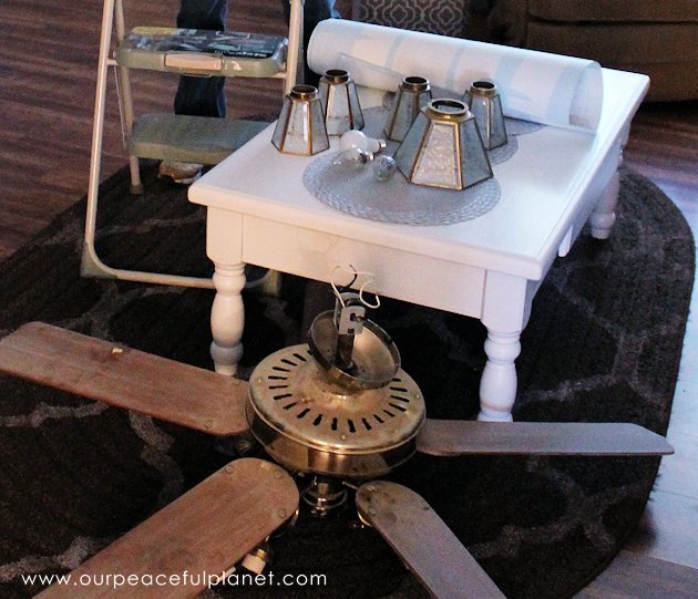 This beautiful illuminated upcycled decor light was made from the covers on an old ceiling fan. Learn to look past what something is to what it can become.
