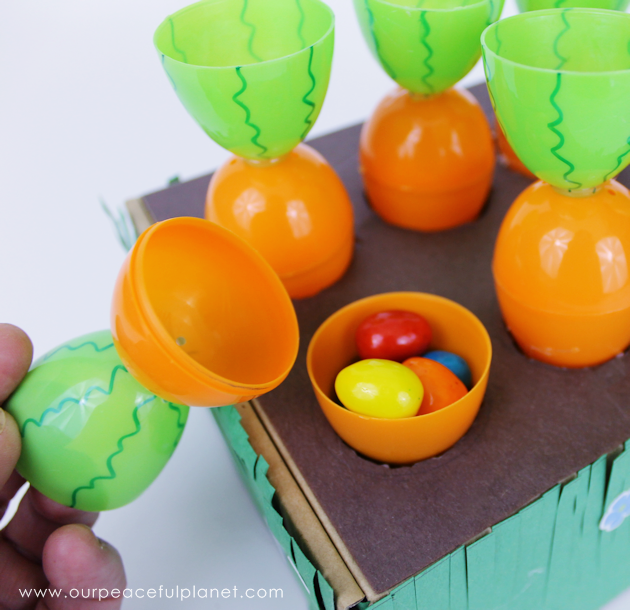 Make this cute carrot garden diy Easter basket using plastic eggs, a box and some construction paper! You can fill the box and the carrot eggs with goodies.