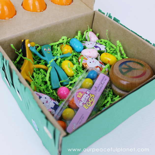 Make this cute carrot garden diy Easter basket using plastic eggs, a box and some construction paper! You can fill the box and the carrot eggs with goodies.