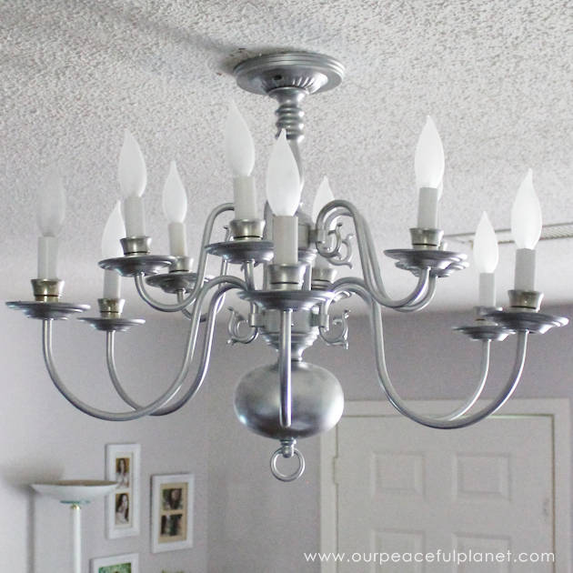 A simple chandelier makeover using a chandelier found at a thrift store. It replaced a ceiling fan in and was flush mounted. The effect was stunning!