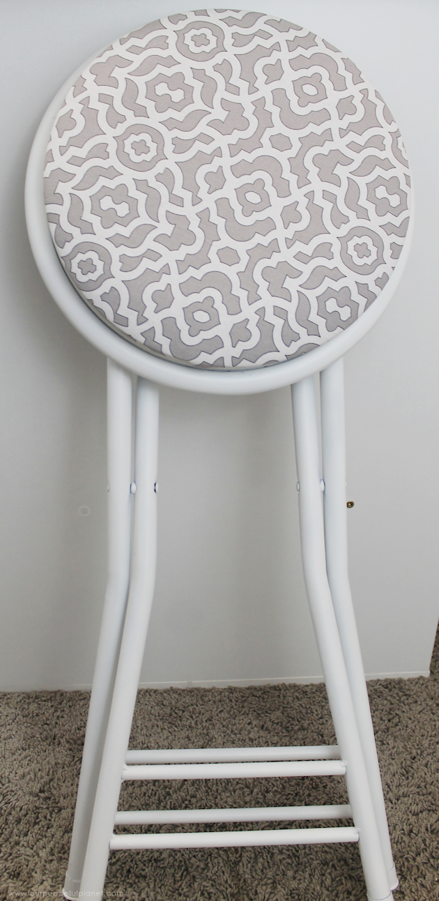 This cheap folding stool from Amazon was for my craft room. It just needed a little love. i.e. paint and material plus a wood circle to make it tad higher. I also added the feature of making the fabric top removable in case I want to change the color at some point.