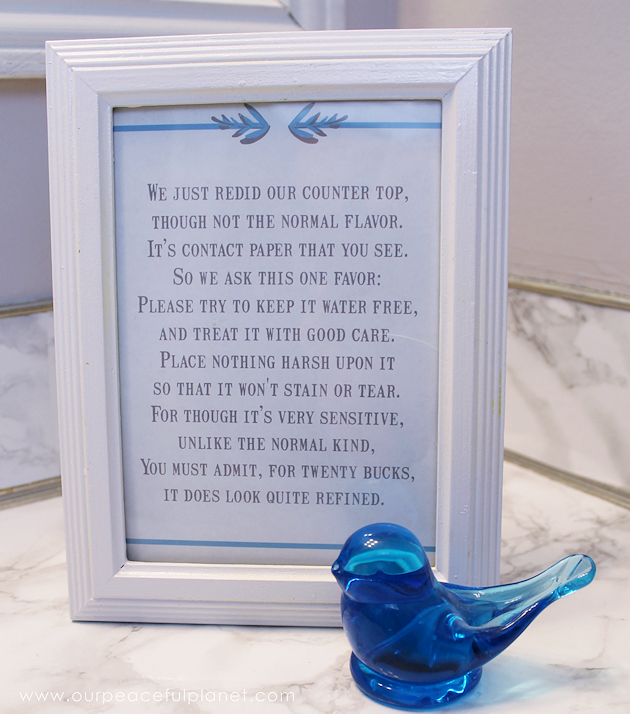 Transform your bathroom for only a few dollars with a contact paper countertop. You'll be amazed at how beautiful it looks & so will your family & guests!