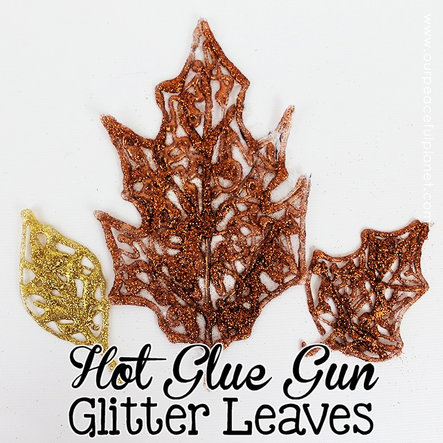 Make these beautiful DIY fall decorations with a glue gun and some glitter! Use the leaves in table settings, wall hangings or any other fall decor item.
