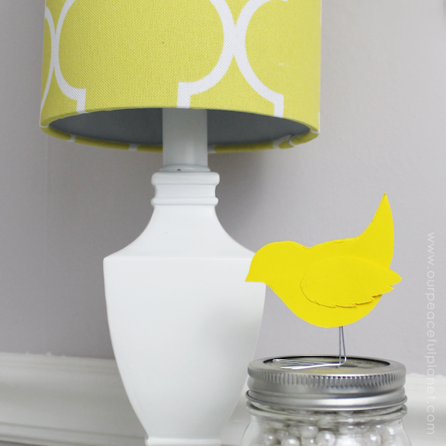 These sweet little birdies are perfect for a touch of whimsy DIY room decor and they can be placed in any room you like! Sit them on shelves, mantles, on top of books... you can even put a row on top of a door jam! Using our pattern you can make whatever colors you like. All you need is the paper of your choice and two paperclips and glue.