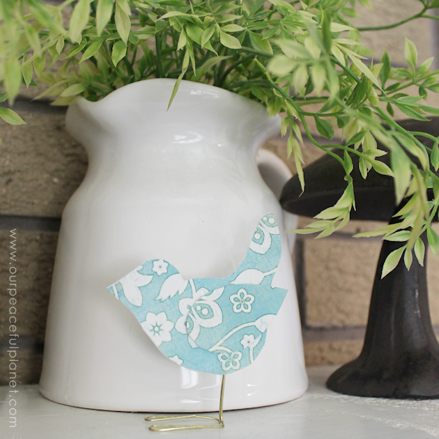 These sweet little birdies are perfect for a touch of whimsy DIY room decor and they can be placed in any room you like! Sit them on shelves, mantles, on top of books... you can even put a row on top of a door jam! Using our pattern you can make whatever colors you like. All you need is the paper of your choice and two paperclips and glue.