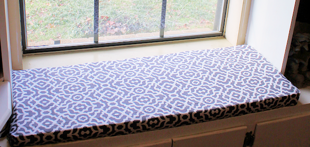 Upholstery pins are are an incredibly simple yet versatile tool for doing some quick no-sew recovering in your home. We recovered a window seat in minutes!