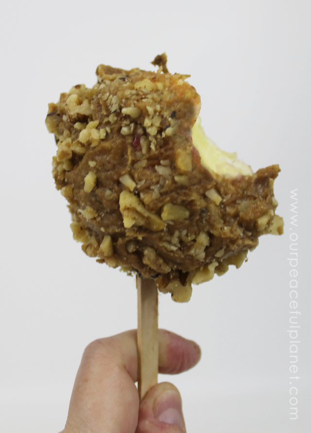 Our Simple Healthy Candy Apple Recipe is quick fall treat that you can feel good about eating and giving the kids. All it takes is apples, dates and nuts!