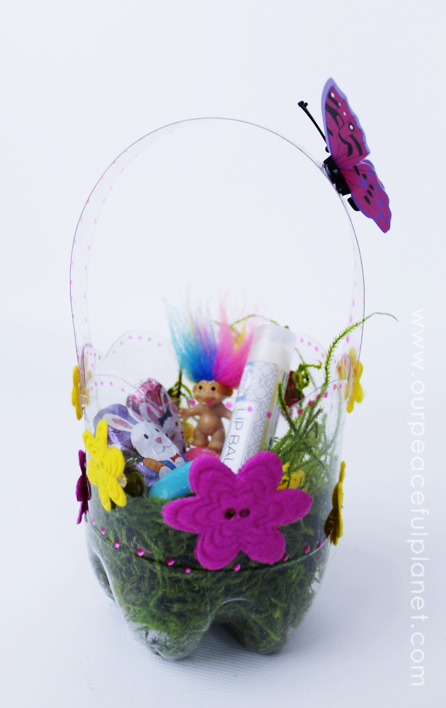 Pretty little custom DIY Easter baskets you can make in minutes using a plastic soda bottle of any size! Use for Easter or as a gift basket for any time!